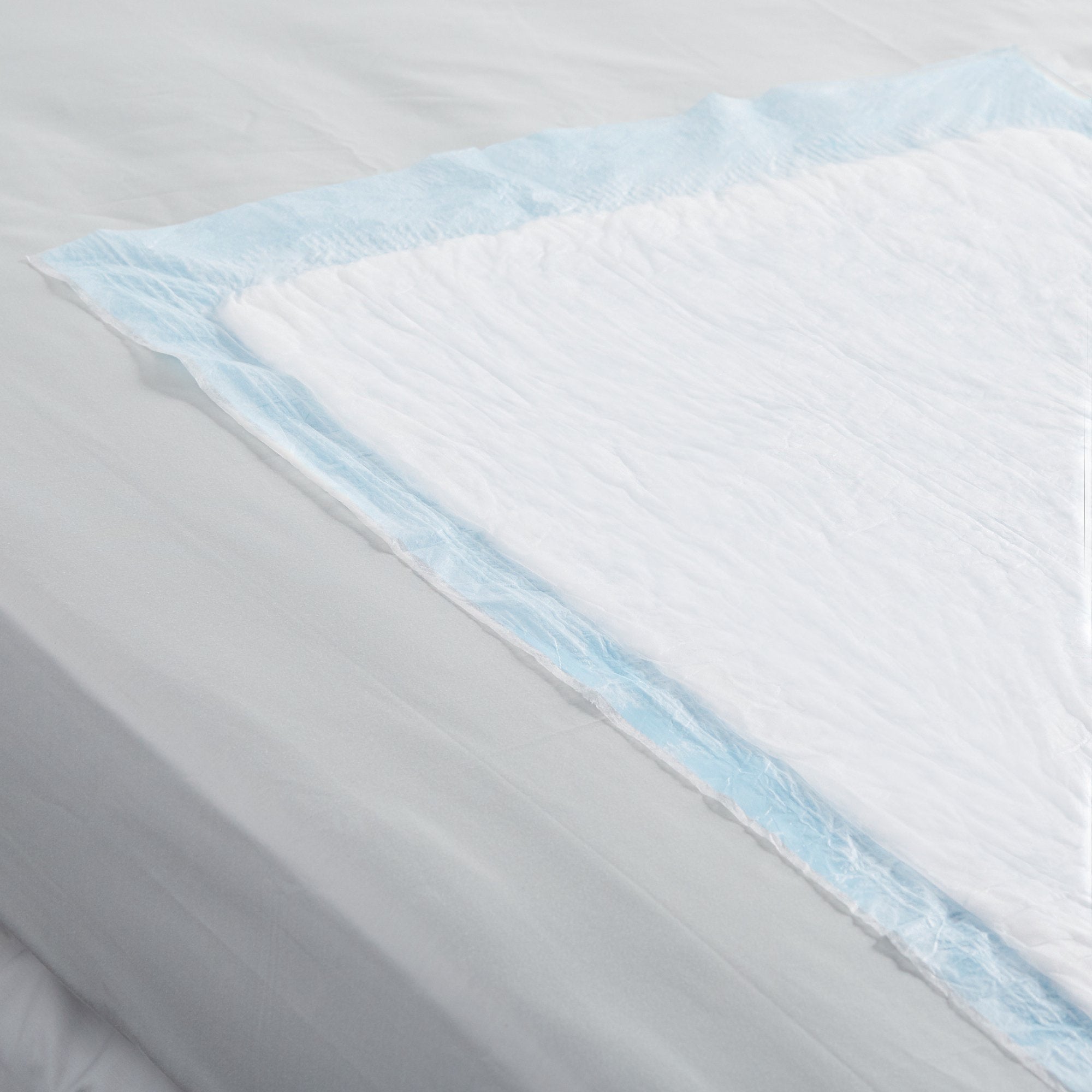 Disposable Underpad Simplicity™ Basic 23 X 36 Inch Fluff Light Absorbency - image 4